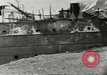 Immagine di Danni da bombardamento giapponese di Harbor olandese Aleutian Islands Alaska USA, 1942, secondo 46 filmato di repertorio 65675058382