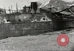 Immagine di Danni da bombardamento giapponese di Harbor olandese Aleutian Islands Alaska USA, 1942, secondo 47 filmato di repertorio 65675058382
