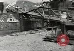 Immagine di Danni da bombardamento giapponese di Harbor olandese Aleutian Islands Alaska USA, 1942, secondo 49 filmato di repertorio 65675058382