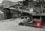Immagine di Danni da bombardamento giapponese di Harbor olandese Aleutian Islands Alaska USA, 1942, secondo 50 filmato di repertorio 65675058382