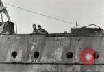 Immagine di Danni da bombardamento giapponese di Harbor olandese Aleutian Islands Alaska USA, 1942, secondo 53 filmato di repertorio 65675058382
