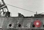 Immagine di Danni da bombardamento giapponese di Harbor olandese Aleutian Islands Alaska USA, 1942, secondo 54 filmato di repertorio 65675058382