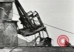 Immagine di Danni da bombardamento giapponese di Harbor olandese Aleutian Islands Alaska USA, 1942, secondo 55 filmato di repertorio 65675058382
