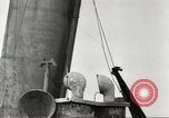 Immagine di Danni da bombardamento giapponese di Harbor olandese Aleutian Islands Alaska USA, 1942, secondo 57 filmato di repertorio 65675058382