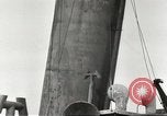 Immagine di Danni da bombardamento giapponese di Harbor olandese Aleutian Islands Alaska USA, 1942, secondo 58 filmato di repertorio 65675058382