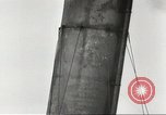 Immagine di Danni da bombardamento giapponese di Harbor olandese Aleutian Islands Alaska USA, 1942, secondo 59 filmato di repertorio 65675058382