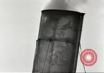 Immagine di Danni da bombardamento giapponese di Harbor olandese Aleutian Islands Alaska USA, 1942, secondo 60 filmato di repertorio 65675058382
