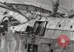 Immagine di Danni da bombardamento giapponese di Harbor olandese Aleutian Islands Alaska USA, 1942, secondo 61 filmato di repertorio 65675058382