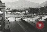 Immagine di Le forze giapponesi sfilano su Queens Road a Hong Kong Hong Kong, 1941, secondo 32 filmato di repertorio 65675058392