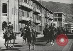 Immagine di Le forze giapponesi sfilano su Queens Road a Hong Kong Hong Kong, 1941, secondo 37 filmato di repertorio 65675058392