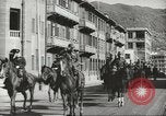 Immagine di Le forze giapponesi sfilano su Queens Road a Hong Kong Hong Kong, 1941, secondo 38 filmato di repertorio 65675058392