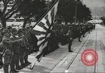 Immagine di Le forze giapponesi sfilano su Queens Road a Hong Kong Hong Kong, 1941, secondo 42 filmato di repertorio 65675058392