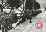 Immagine di Le forze giapponesi sfilano su Queens Road a Hong Kong Hong Kong, 1941, secondo 43 filmato di repertorio 65675058392