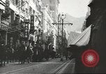 Immagine di Le forze giapponesi sfilano su Queens Road a Hong Kong Hong Kong, 1941, secondo 58 filmato di repertorio 65675058392