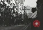Immagine di Le forze giapponesi sfilano su Queens Road a Hong Kong Hong Kong, 1941, secondo 61 filmato di repertorio 65675058392