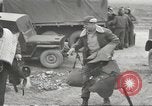 Image of airmen unload equipment Aleutian Islands Alaska USA, 1945, second 3 stock footage video 65675058440