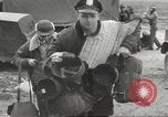 Image of airmen unload equipment Aleutian Islands Alaska USA, 1945, second 6 stock footage video 65675058440