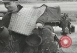 Image of airmen unload equipment Aleutian Islands Alaska USA, 1945, second 7 stock footage video 65675058440
