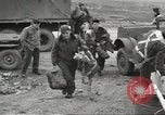 Image of airmen unload equipment Aleutian Islands Alaska USA, 1945, second 9 stock footage video 65675058440
