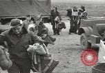 Image of airmen unload equipment Aleutian Islands Alaska USA, 1945, second 12 stock footage video 65675058440