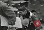 Image of airmen unload equipment Aleutian Islands Alaska USA, 1945, second 14 stock footage video 65675058440