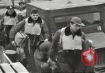 Image of airmen unload equipment Aleutian Islands Alaska USA, 1945, second 17 stock footage video 65675058440