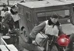 Image of airmen unload equipment Aleutian Islands Alaska USA, 1945, second 18 stock footage video 65675058440