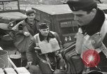 Image of airmen unload equipment Aleutian Islands Alaska USA, 1945, second 21 stock footage video 65675058440