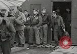 Image of airmen unload equipment Aleutian Islands Alaska USA, 1945, second 27 stock footage video 65675058440
