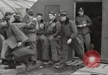 Image of airmen unload equipment Aleutian Islands Alaska USA, 1945, second 29 stock footage video 65675058440