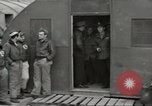 Image of airmen unload equipment Aleutian Islands Alaska USA, 1945, second 31 stock footage video 65675058440