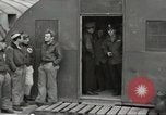 Image of airmen unload equipment Aleutian Islands Alaska USA, 1945, second 32 stock footage video 65675058440
