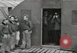 Image of airmen unload equipment Aleutian Islands Alaska USA, 1945, second 35 stock footage video 65675058440