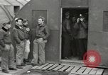Image of airmen unload equipment Aleutian Islands Alaska USA, 1945, second 36 stock footage video 65675058440