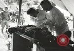 Image of field ambulance Pacific Theater, 1943, second 22 stock footage video 65675058477