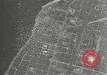 Image of drop bombs Kobe Japan, 1945, second 42 stock footage video 65675058494