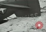 Image of crashed C 64 aircraft Aleutian Islands Alaska USA, 1943, second 50 stock footage video 65675058502