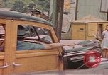 Standbild Mädchen auf windiger Tag mit Puerto Rican Kapitolhaube im Hintergrund Puerto Rico, 1941, aus Sekunde 13 historischem Filmmaterial Videoclip 65675058642