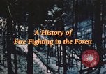 Image of forest fire United States USA, 1984, second 52 stock footage video 65675058683