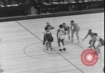 Image of basketball game between City College and BYU New York United States USA, 1950, second 5 stock footage video 65675058712