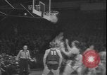 Image of basketball game between City College and BYU New York United States USA, 1950, second 18 stock footage video 65675058712
