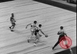 Image of basketball game between City College and BYU New York United States USA, 1950, second 25 stock footage video 65675058712