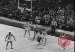 Image of basketball game between City College and BYU New York United States USA, 1950, second 31 stock footage video 65675058712