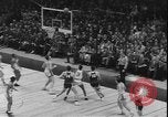 Image of basketball game between City College and BYU New York United States USA, 1950, second 32 stock footage video 65675058712