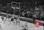 Image of basketball game between City College and BYU New York United States USA, 1950, second 33 stock footage video 65675058712
