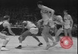 Image of basketball game between City College and BYU New York United States USA, 1950, second 47 stock footage video 65675058712