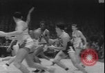Image of basketball game between City College and BYU New York United States USA, 1950, second 48 stock footage video 65675058712