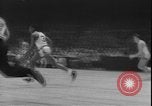 Image of basketball game between City College and BYU New York United States USA, 1950, second 55 stock footage video 65675058712