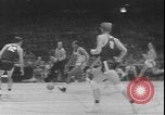Image of basketball game between City College and BYU New York United States USA, 1950, second 57 stock footage video 65675058712