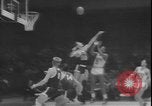 Image of basketball game between City College and BYU New York United States USA, 1950, second 59 stock footage video 65675058712
